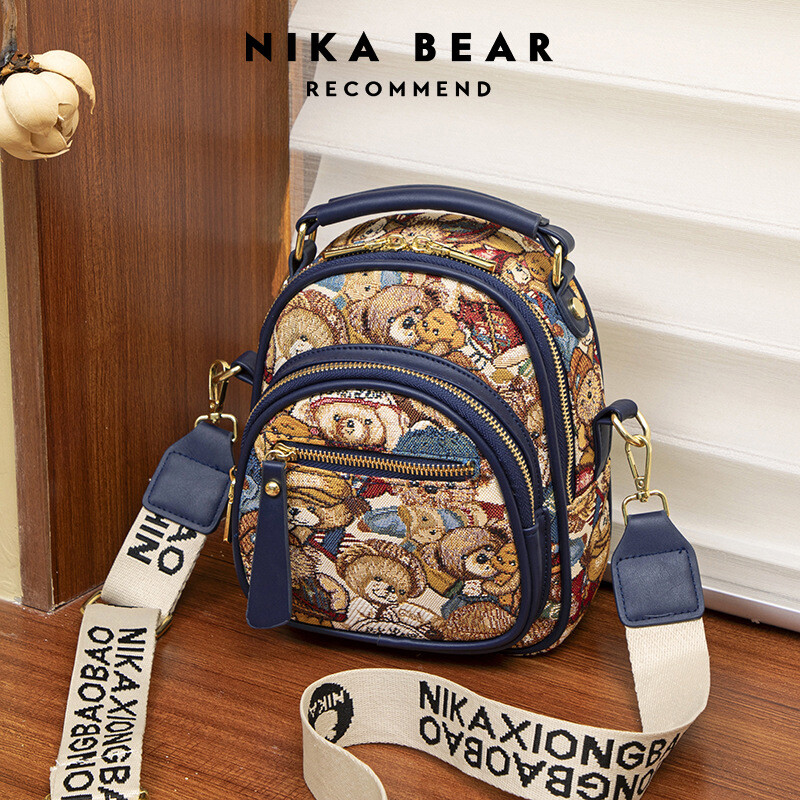 Ovogodišnja nova popularna torba s izvezenim medvjedom i višeslojnim patentnim zatvaračem je praktična, svestrana, ležerna, moderna, slatka i moderna ženska torba