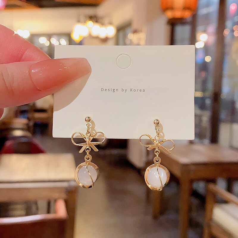 S925 сребърна игла леки луксозни нишови перлени обеци за жени супер светкавичен диамант котешко око цвете обеци мрежа обеци за знаменитости на едро