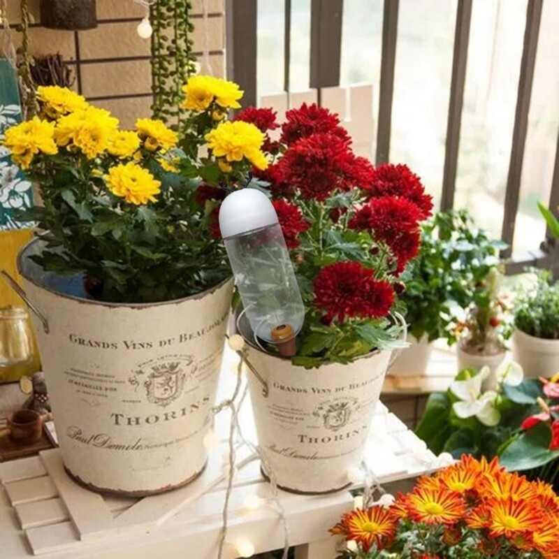 Pašlaistoša pilinātāja pudele Automātiska iekštelpu augu pilināmā laistīšanas ierīce Ceļojuma podos augu laistīšanas laistīšanas dārza rīks