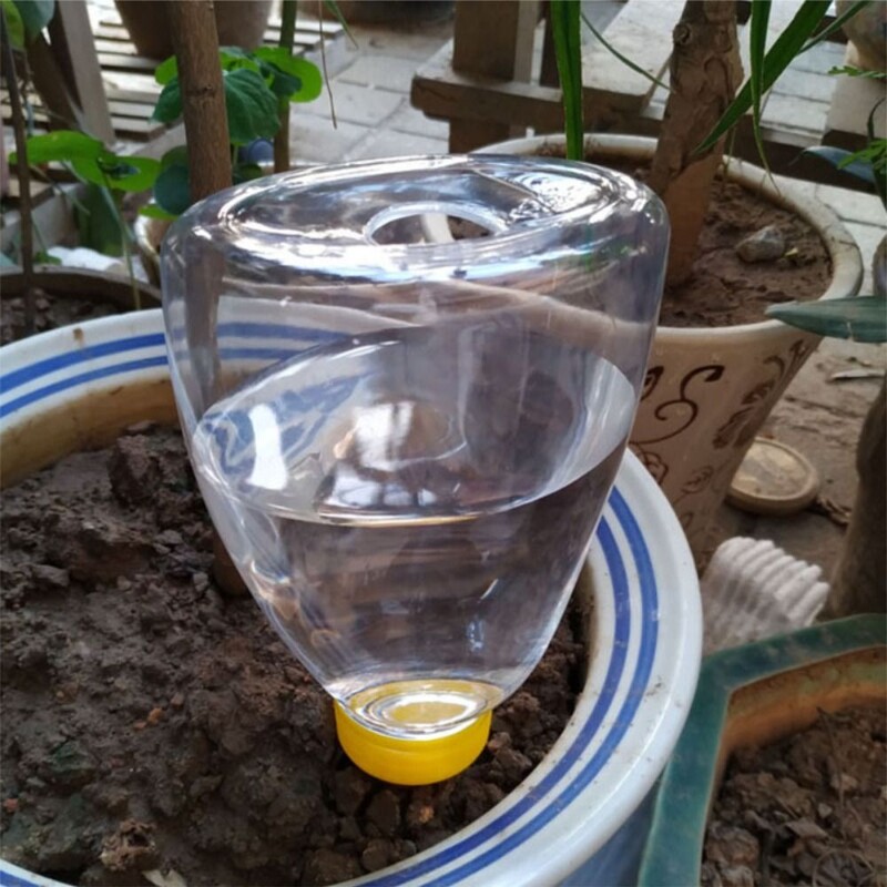 Pašlaistoša pilinātāja pudele Automātiska iekštelpu augu pilināmā laistīšanas ierīce Ceļojuma podos augu laistīšanas laistīšanas dārza rīks