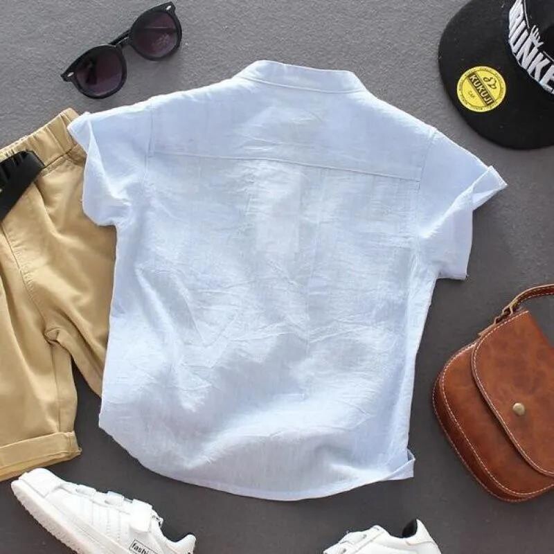 Fiú ruházat nyári pamut divat vékony egyszínű kerek nyakú, összefűzött zsebgombos laza alkalmi koreai változatú póló
