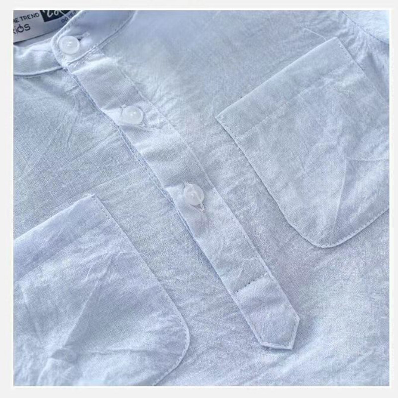 Fiú ruházat nyári pamut divat vékony egyszínű kerek nyakú, összefűzött zsebgombos laza alkalmi koreai változatú póló