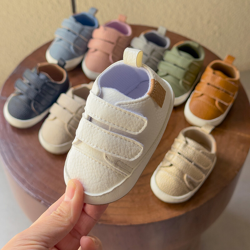 Jaundzimušo apavi Zēniem Zēniem Meiteņu Kurpes Klasiskās Ādas Gumijas Zole Pretslīdēšanas Toddler First Walkers Zīdaiņu meiteņu apavi Mokasīni