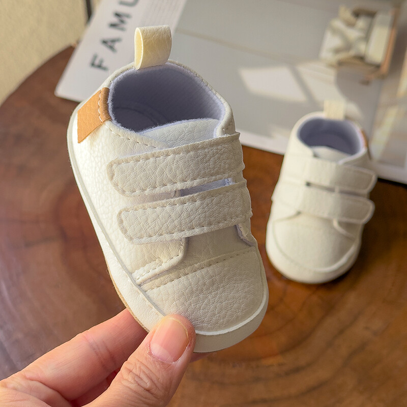 Jaundzimušo apavi Zēniem Zēniem Meiteņu Kurpes Klasiskās Ādas Gumijas Zole Pretslīdēšanas Toddler First Walkers Zīdaiņu meiteņu apavi Mokasīni
