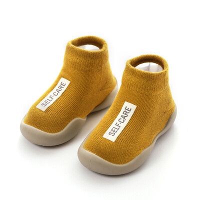 Unisex zīdaiņu apavi Pirmie apavi Zīdaiņu staigulīši Toddler First Walker Baby Girl Bērni Mīksta gumijas zole Bērnu apavi adīti zābaciņi Pretslīdes