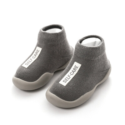 Unisex zīdaiņu apavi Pirmie apavi Zīdaiņu staigulīši Toddler First Walker Baby Girl Bērni Mīksta gumijas zole Bērnu apavi adīti zābaciņi Pretslīdes