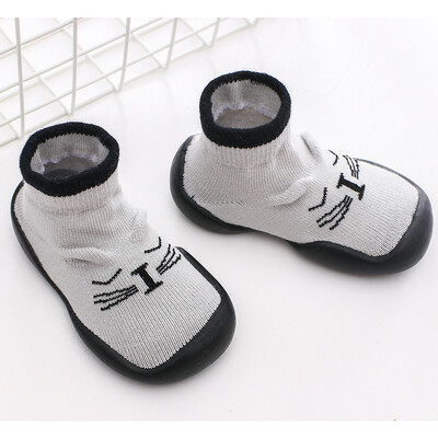 Unisex zīdaiņu apavi Pirmie apavi Zīdaiņu staigulīši Toddler First Walker Baby Girl Bērni Mīksta gumijas zole Bērnu apavi adīti zābaciņi Pretslīdes