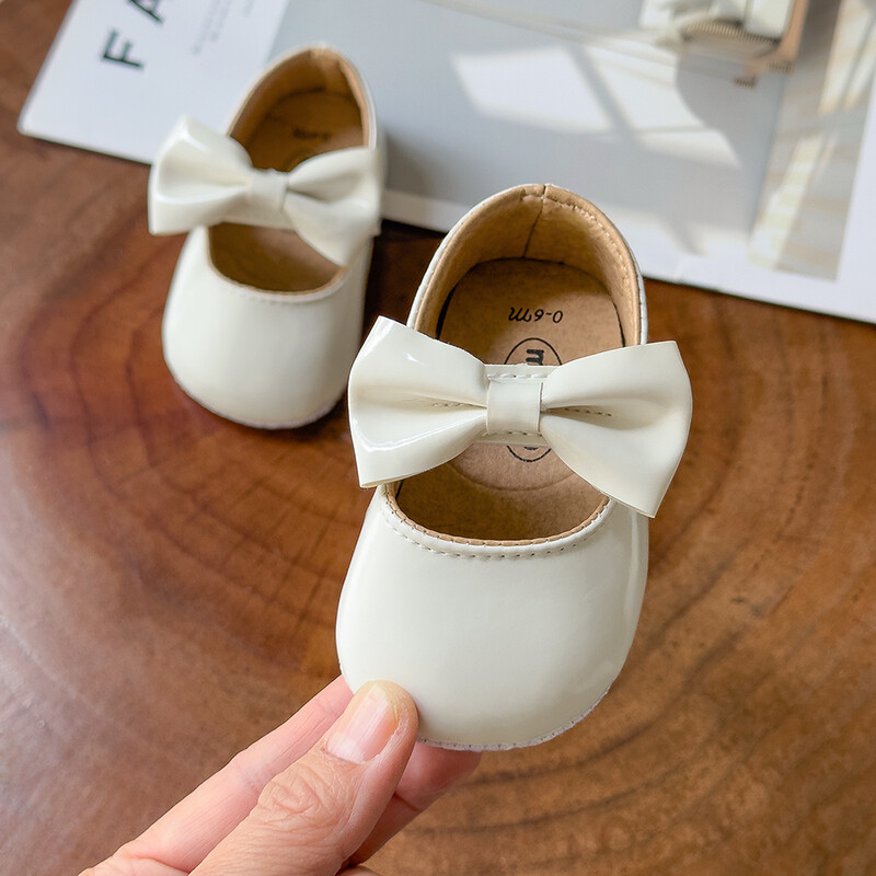 Jaundzimušo bērnu apavi zīdaiņu meiteņu apavi PU Pretslīdes Bowknot Klasiski princešu kleitu apavi Toddler First Walker Crib Shoe