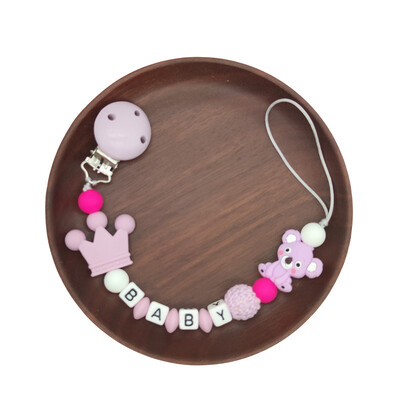 Ar rokām darināta silikona zīdaiņu koka manekena knupja piespraudes droša zobu ķēdīte.