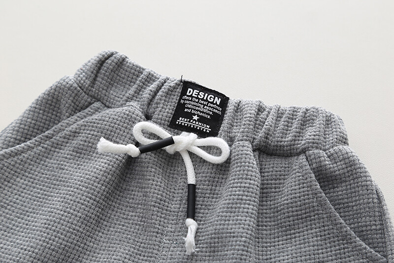 Kokvilnas mīksts bērnu zēnu un meiteņu apģērbu komplekti Ikdienas modes bērnu kostīmi ar īsām piedurknēm Vasaras apģērbi