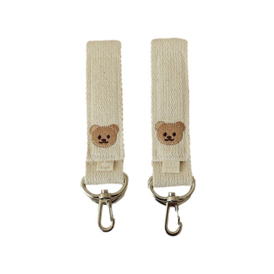 Izšūts lācis karikatūras āķis Izturīgs universāls ratiņu klips Bērnu ratu āķi pakarināšanai Mammu somām Autiņbiksīšu somu piederumi