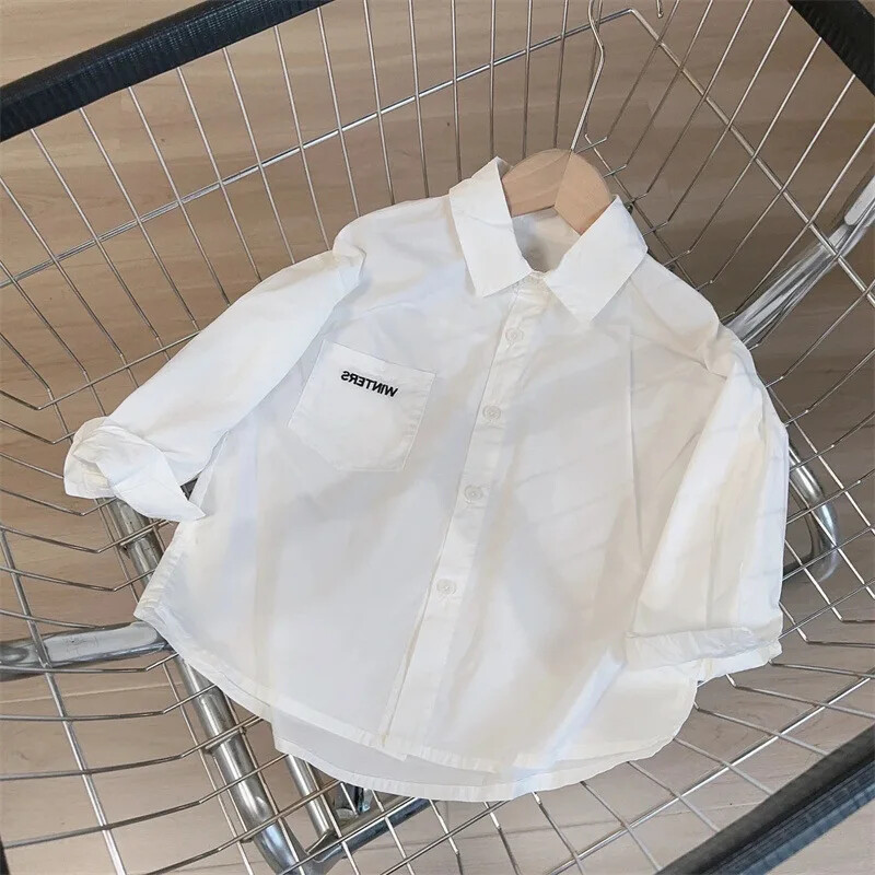 Bērnu balts krekls ar garām piedurknēm Stilīgs, vienkāršs bērnu tops 2024. gada pavasarim un rudenim, moderns jauna stila burtu tops