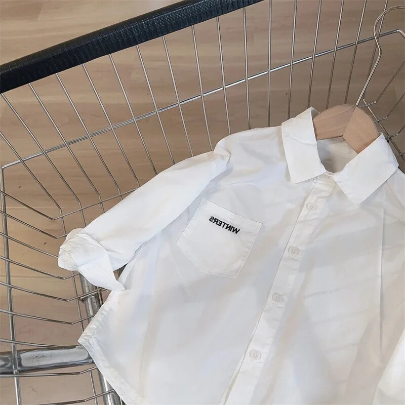 Bērnu balts krekls ar garām piedurknēm Stilīgs, vienkāršs bērnu tops 2024. gada pavasarim un rudenim, moderns jauna stila burtu tops