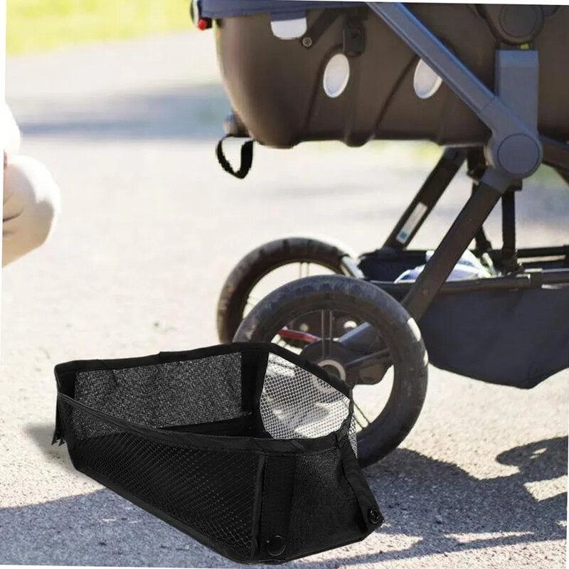 Universāla bērnu ratiņu apakšas organizatora soma, pārnēsājams auduma auduma rotaļlietu uzglabāšanas grozs ar cieto dēļu ratiņu piederumiem, melns