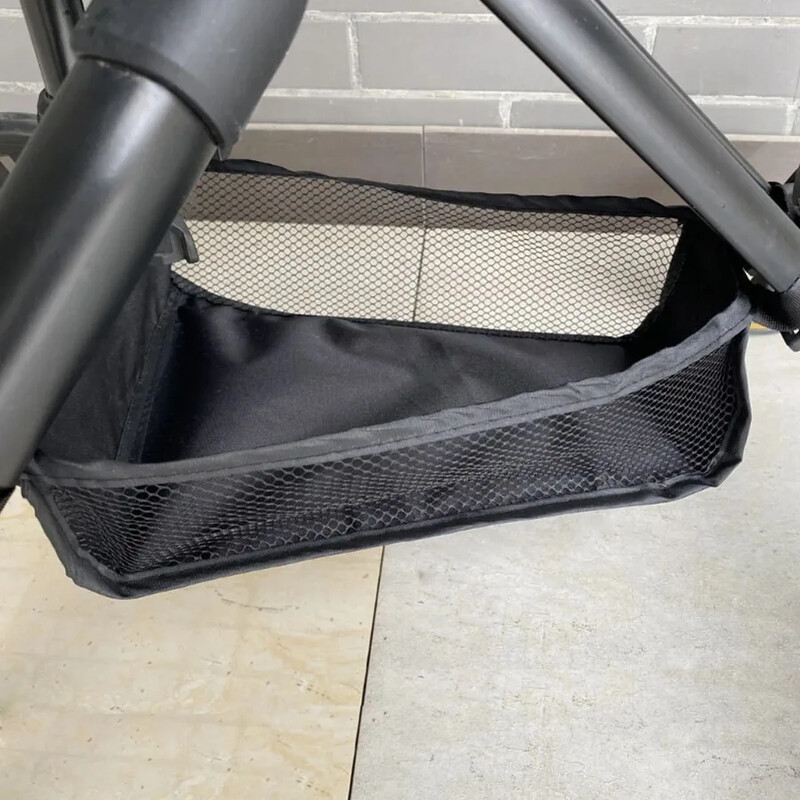 Universāla bērnu ratiņu apakšas organizatora soma, pārnēsājams auduma auduma rotaļlietu uzglabāšanas grozs ar cieto dēļu ratiņu piederumiem, melns