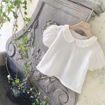 2025. gada vasara Jauna mazuļu meiteņu vienkrāsaini krekli ar piedurknēm Kokvilnas zīdaiņu T krekli Toddler Ikdienas atloks Krekli Bērnu apģērbi