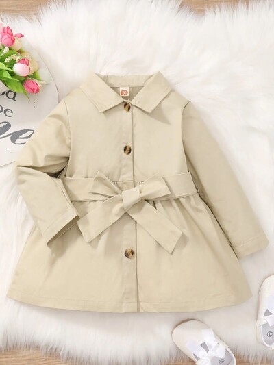 Kevadine ja sügisene täiskuu tüdrukule beebi revääriga pealismantel Briti stiilis aprikoos Lihtsa rinnaga pikkade varrukatega vöö.