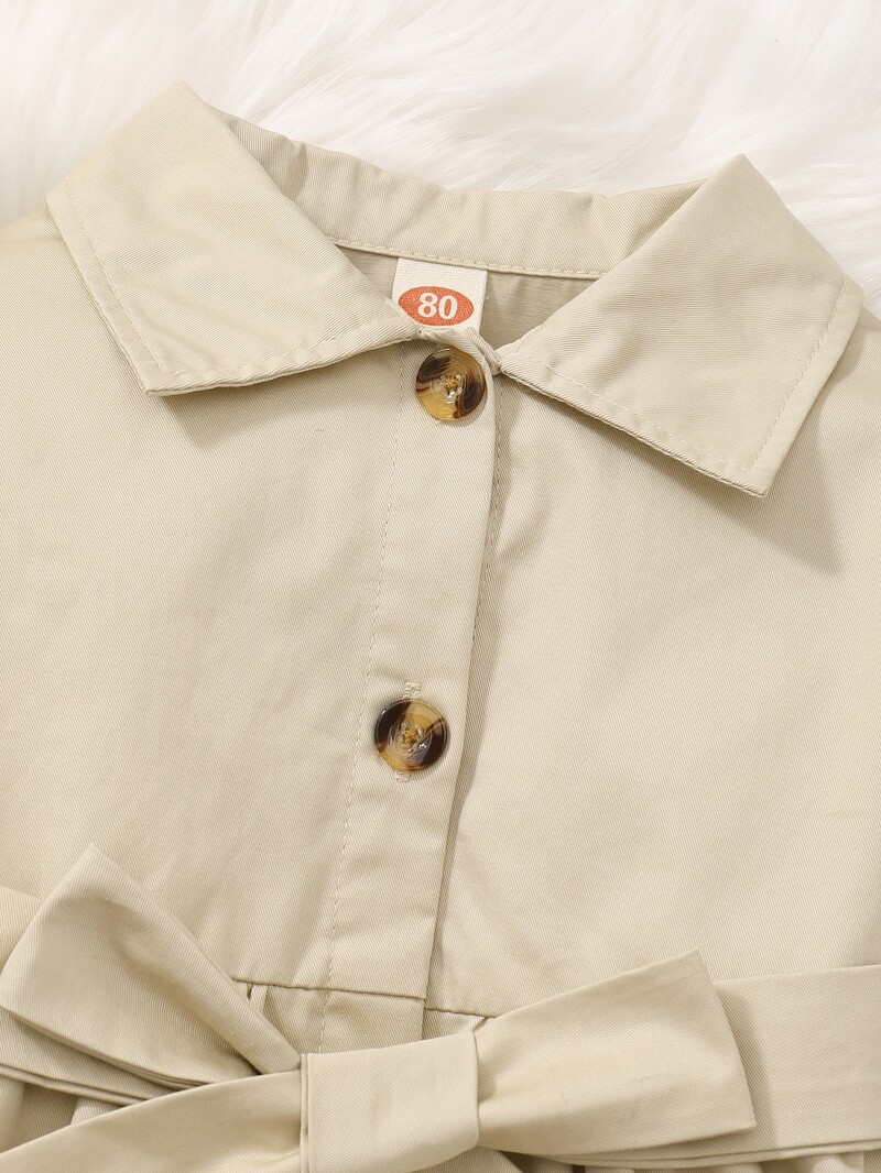 Kevadine ja sügisene täiskuu tüdrukule beebi revääriga pealismantel Briti stiilis aprikoos Lihtsa rinnaga pikkade varrukatega vöö.