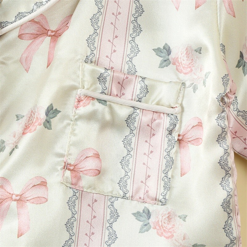 Zīdaiņu zīdaiņu meiteņu atpūtas apģērbs Vasaras mazuļu pidžamas komplekts bantītes ziedu raksta pogai ar īsām piedurknēm Topi Šorti Mazu bērnu mājas apģērbi