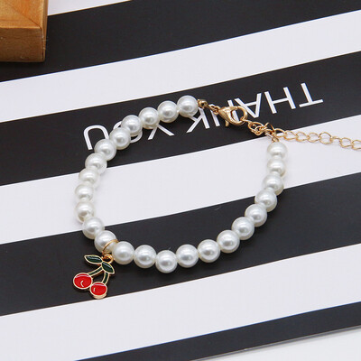 Jauki modes piederumi mājdzīvnieku piederumi Kaķu aksesuāri Kaklarota Pērļu kristāla mājdzīvnieku kaklasiksna Pērle ar masīvkristāla kuloniem Mājdzīvnieku izstrādājumi