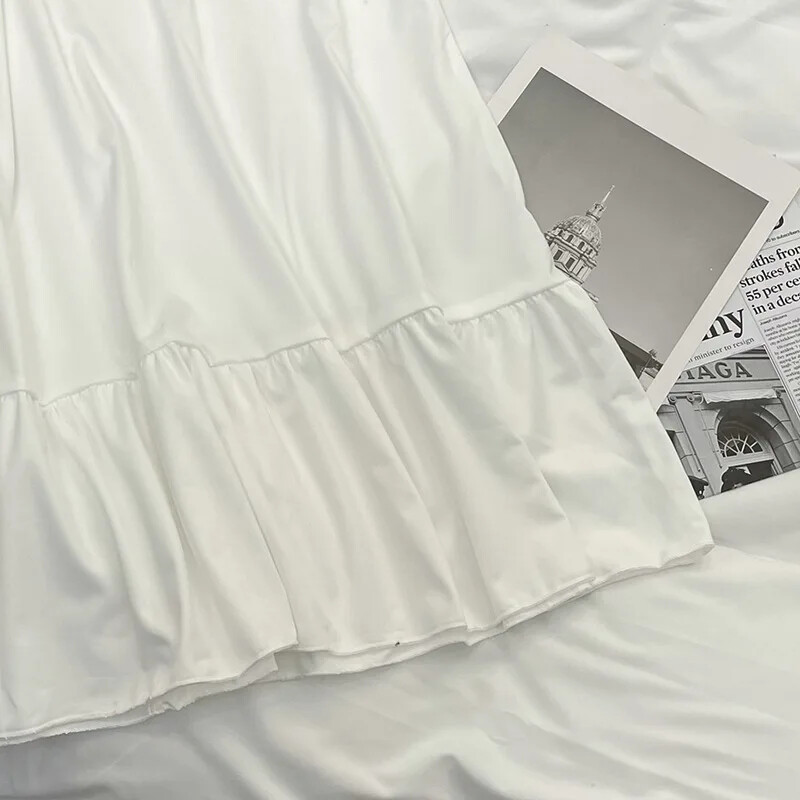 Vasaros stiliaus įžymybių saldūs miegui skirti balti raukiniai medvilniniai naktiniai moteriški viršutiniai drabužiai Namų drabužiai Real Shoot Didmeninė prekyba