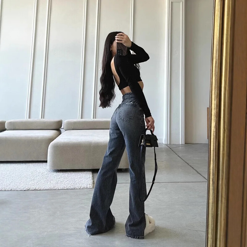 Amazon Europe Street Style Design Sensibility Kellukese põhjaga püksid naiste sügisesed kõrge vöökohaga ebaregulaarsed puusad uute teksadega