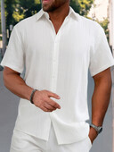 Kokvilnas karstā izpārdošana Vīriešu krekli ar īsām piedurknēm Vasaras vienkrāsaini nolaižama apkakle ikdienas pludmales stila lielizmēra