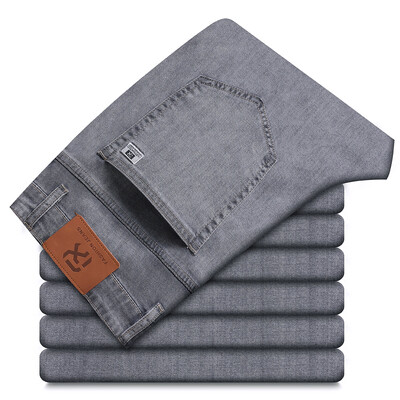 2024 m. pavasaris vasara Vyriški tamprūs džinsai Madingi laisvalaikio plonos džinsinės kelnės Vyriškos mėlynos kelnės Vyriški drabužiai