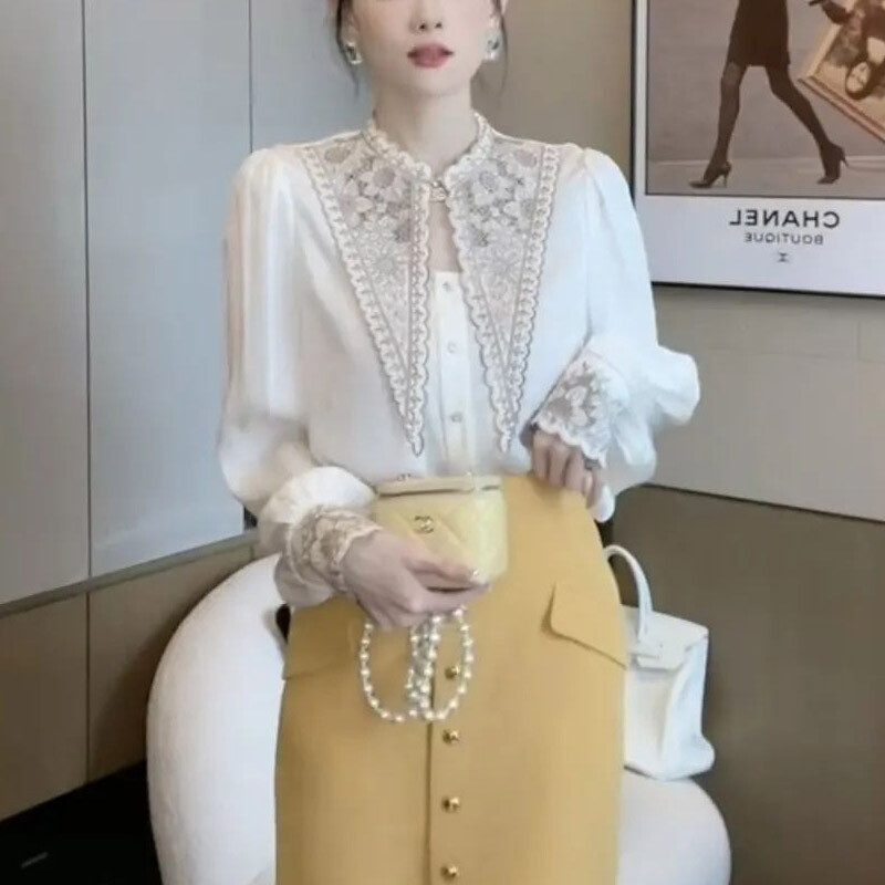 Modes korejiešu baltā izšūta sieviešu blūze ar smailo apkakli, jauna klasiska gadījuma rakstura sieviešu krekls ar garām piedurknēm