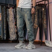 Vyriškos madingos amerikietiškos „High Street“ suplėšytos, išraižytos pataisos, paprastos, tiesios kelnės, džinsinės kelnės