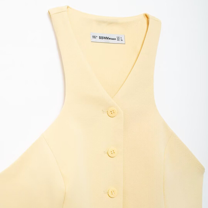 Willshela sieviešu modes ar jostu, dzeltena veste ar V veida kakla izgriezumu, vienrindas jakas bez piedurknēm.