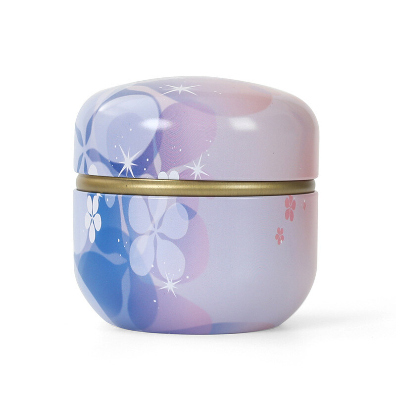 Skārda tējas kastes mājsaimniecības aizzīmogotās tējas iepakojuma kaste pārnēsājamas japāņu stila ziedu tējas mazas apaļas skārda kastes