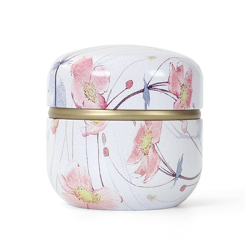 Skārda tējas kastes mājsaimniecības aizzīmogotās tējas iepakojuma kaste pārnēsājamas japāņu stila ziedu tējas mazas apaļas skārda kastes