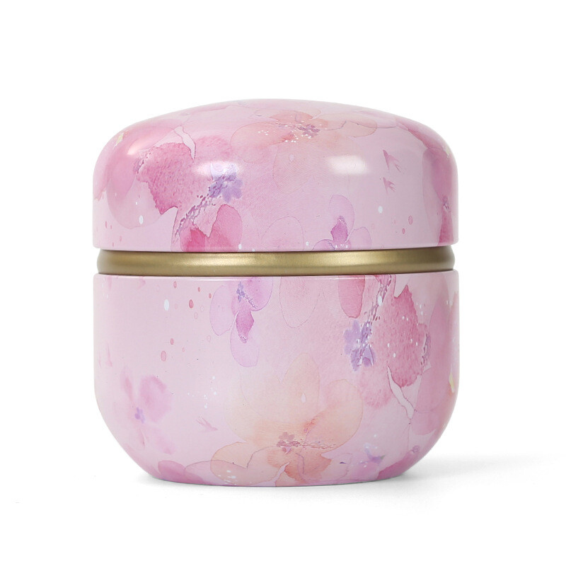 Skārda tējas kastes mājsaimniecības aizzīmogotās tējas iepakojuma kaste pārnēsājamas japāņu stila ziedu tējas mazas apaļas skārda kastes