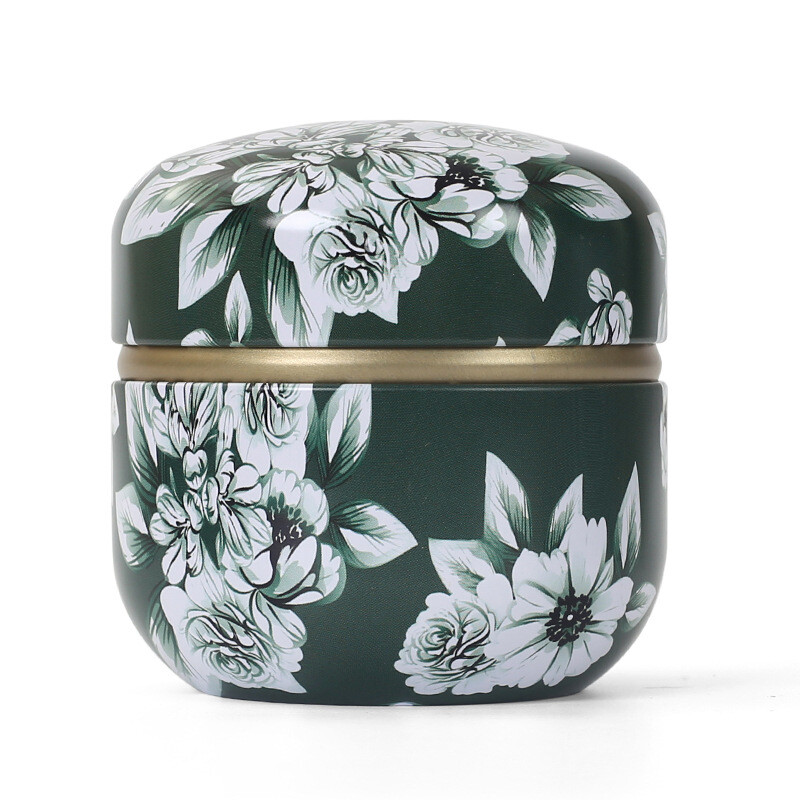 Skārda tējas kastes mājsaimniecības aizzīmogotās tējas iepakojuma kaste pārnēsājamas japāņu stila ziedu tējas mazas apaļas skārda kastes