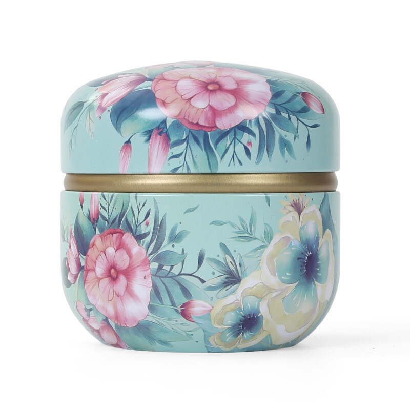 Skārda tējas kastes mājsaimniecības aizzīmogotās tējas iepakojuma kaste pārnēsājamas japāņu stila ziedu tējas mazas apaļas skārda kastes