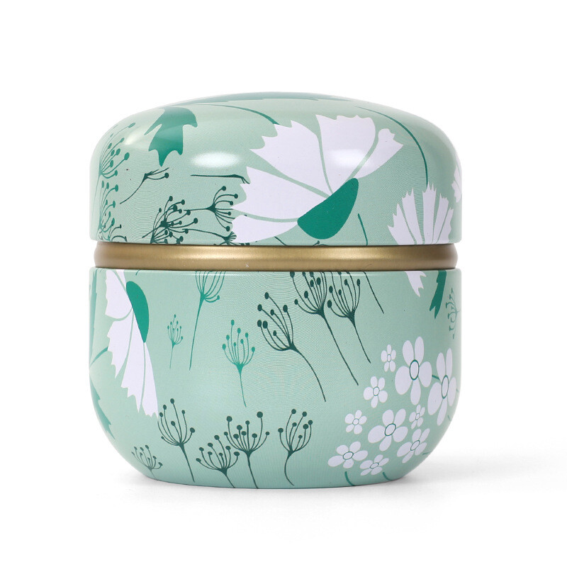 Skārda tējas kastes mājsaimniecības aizzīmogotās tējas iepakojuma kaste pārnēsājamas japāņu stila ziedu tējas mazas apaļas skārda kastes