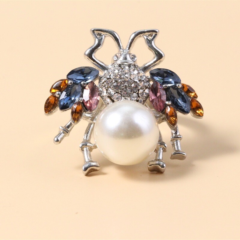 Διασυνοριακό Ευρωπαϊκό και Αμερικάνικο ρυθμιζόμενο δαχτυλίδι με μαργαριτάρι μέλισσας γυναικεία σκουλαρίκια με χρυσό σμάλτο σταγόνας πετρελαίου χρυσό δαχτυλίδι σκουλαρίκια εργοστασιακές απευθείας πωλήσεις