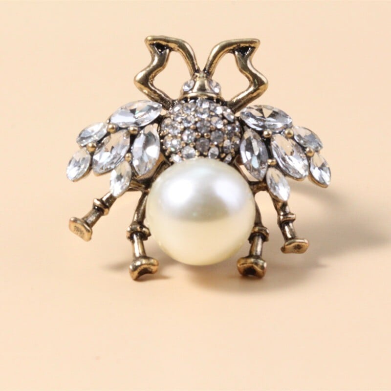 Διασυνοριακό Ευρωπαϊκό και Αμερικάνικο ρυθμιζόμενο δαχτυλίδι με μαργαριτάρι μέλισσας γυναικεία σκουλαρίκια με χρυσό σμάλτο σταγόνας πετρελαίου χρυσό δαχτυλίδι σκουλαρίκια εργοστασιακές απευθείας πωλήσεις