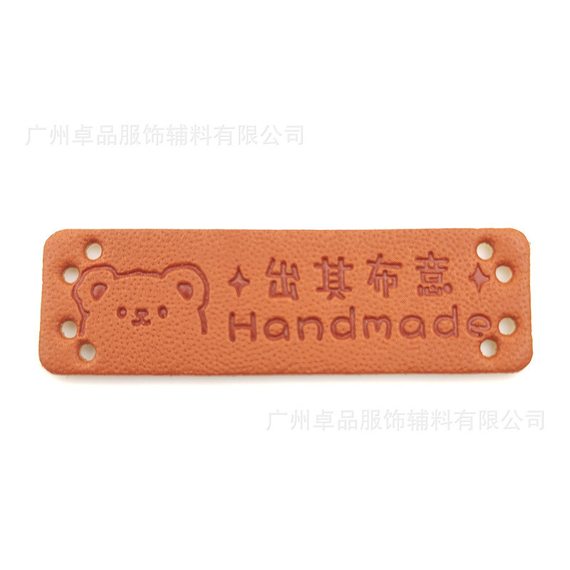Tiesioginis gamyklos pardavimas PU rankų darbo odos etiketė Europos ir Amerikos stiliaus rankų darbo rankų darbo tuščia etiketė Odinių drabužių prekės ženklas