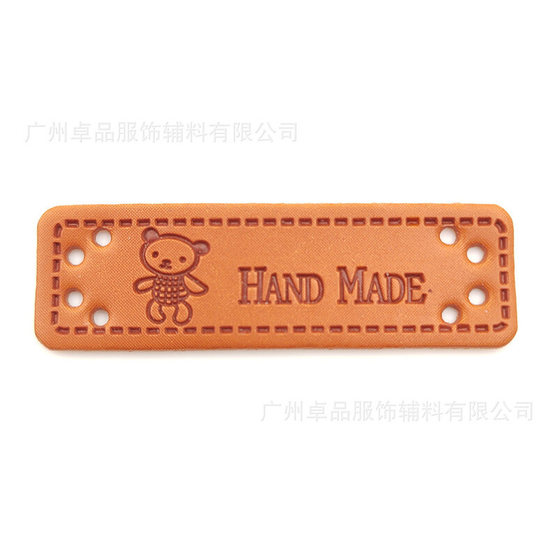 Tiesioginis gamyklos pardavimas PU rankų darbo odos etiketė Europos ir Amerikos stiliaus rankų darbo rankų darbo tuščia etiketė Odinių drabužių prekės ženklas