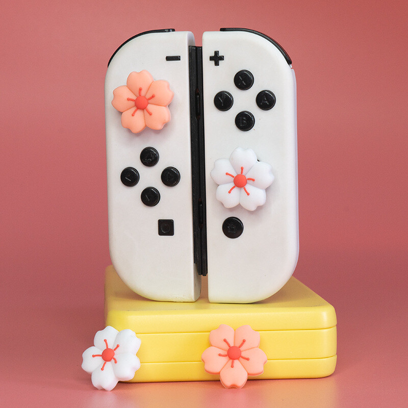 Nintendo Switch oled roktura kursorsviras vāciņš Kursorsviras vāciņa vāciņš rozā un balts silikona vāciņš īpašas formas ķiršu krāsa ns pogas vāciņš