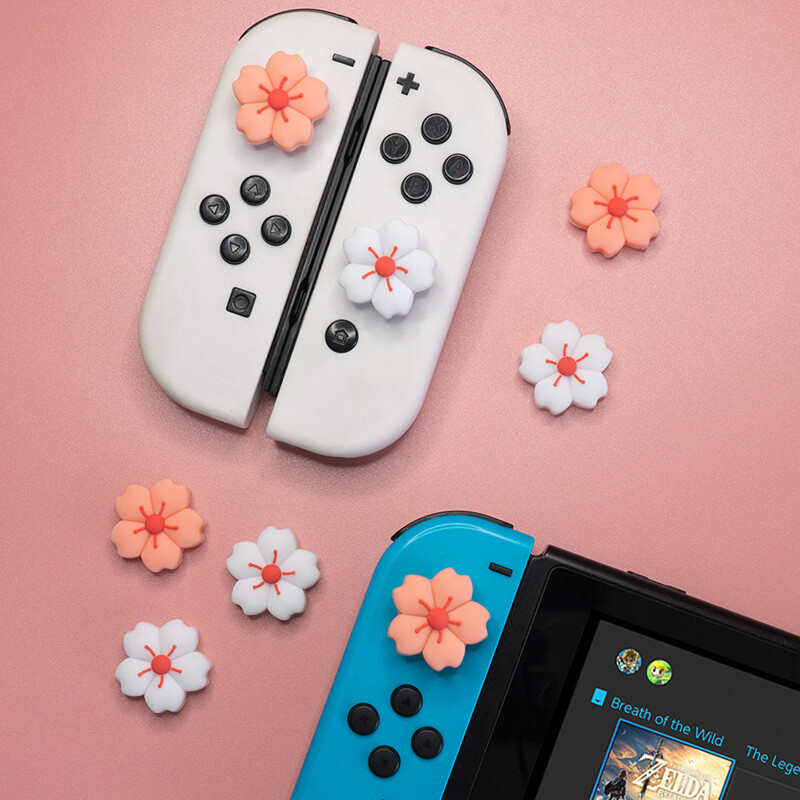 Nintendo Switch oled roktura kursorsviras vāciņš Kursorsviras vāciņa vāciņš rozā un balts silikona vāciņš īpašas formas ķiršu krāsa ns pogas vāciņš