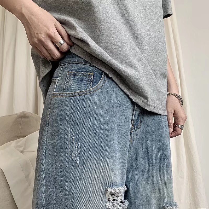 Vasaros mados vyriškos plėšytos džinsinės tiesios laisvos hiphopo elgetos kelnės Honkongo stiliaus studentų devynių taškų kelnės