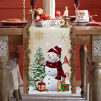 Kalėdinė atmosfera, lininis stalo takelis, tarpsieninis, populiarus Kalėdų eglutės ir restorano staltiesės raštas su Kalėdų Senelio raštu.