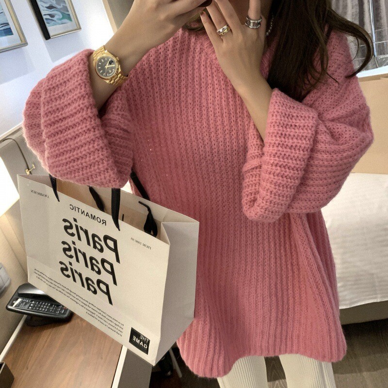 Naiste laiade varrukatega kampsun, keskmise pikkusega, ühevärviline, veekindlate varrukatega, kootud kampsun paksust nõelvillast.