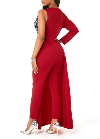 Moteriškas didesnių dydžių kombinezonas aukštu liemeniu, aptemptas ir su blizgučiais, yra. 