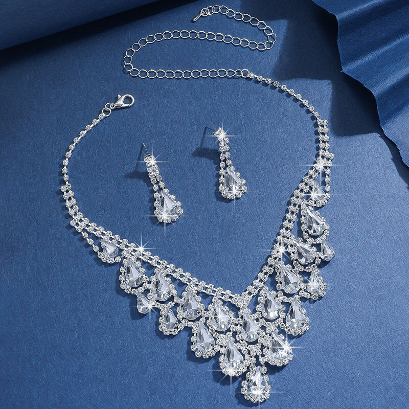 Ģeometriska asaras formas pušķīšu kaklarota, inkrustēta ar dimantiem, eleganta un stilīga atslēgas kaula ķēdīte, grezns augstas klases rotaslietu komplekts Eiropas un Amerikas stilā.