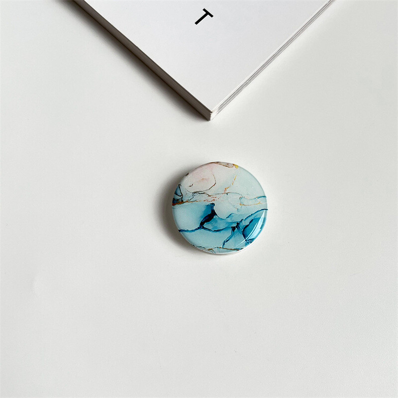 Epoksidinės dervos oro pagalvėlės laikiklis su marmuro raštu, kūrybingas darbalaukio „tinginio“ kilimėlis su skaidriu pagrindu, tinkamas tarpvalstybinei prekybai.