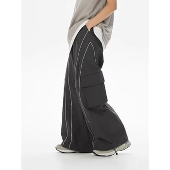 Új női tavaszi/nyári karcsúsított lezser nadrág, amerikai high street stílus, bő egyenes szárú, laza fazonú, cargo nadrág húzózsinórral és széles szárral.